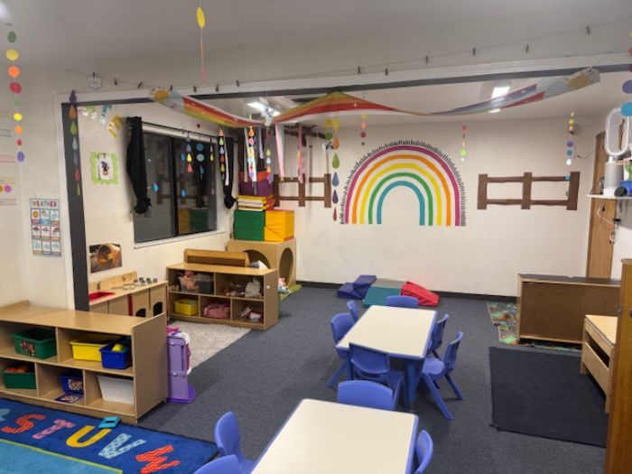 two preschool girls smiling