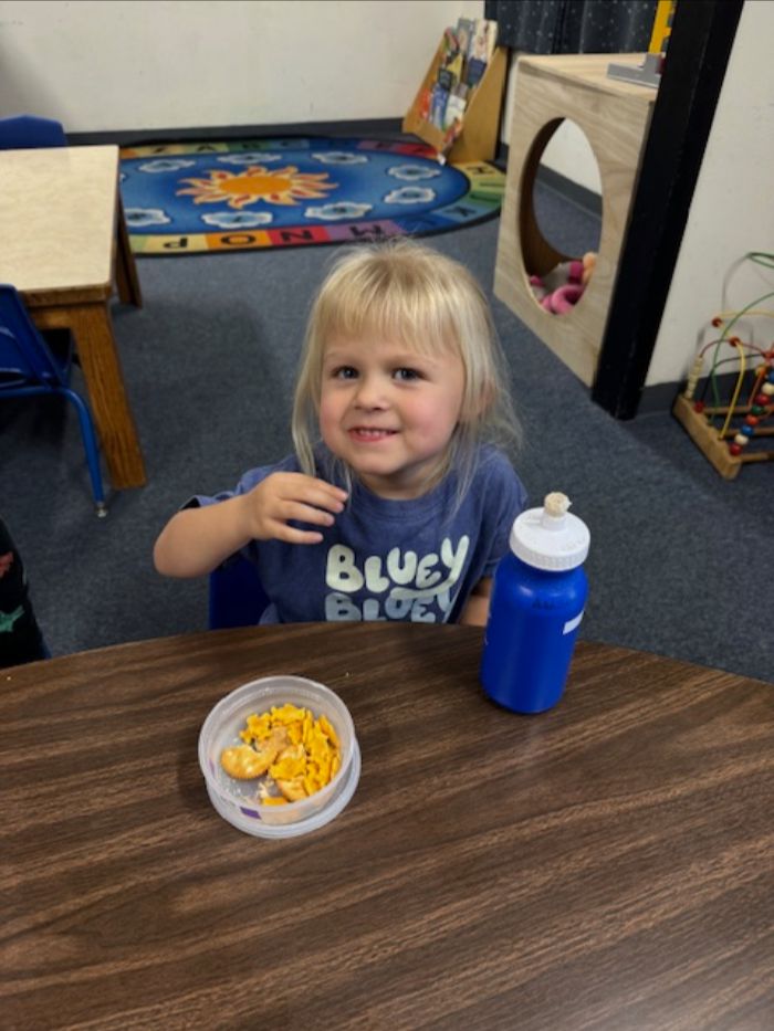 Infant palying with blocks